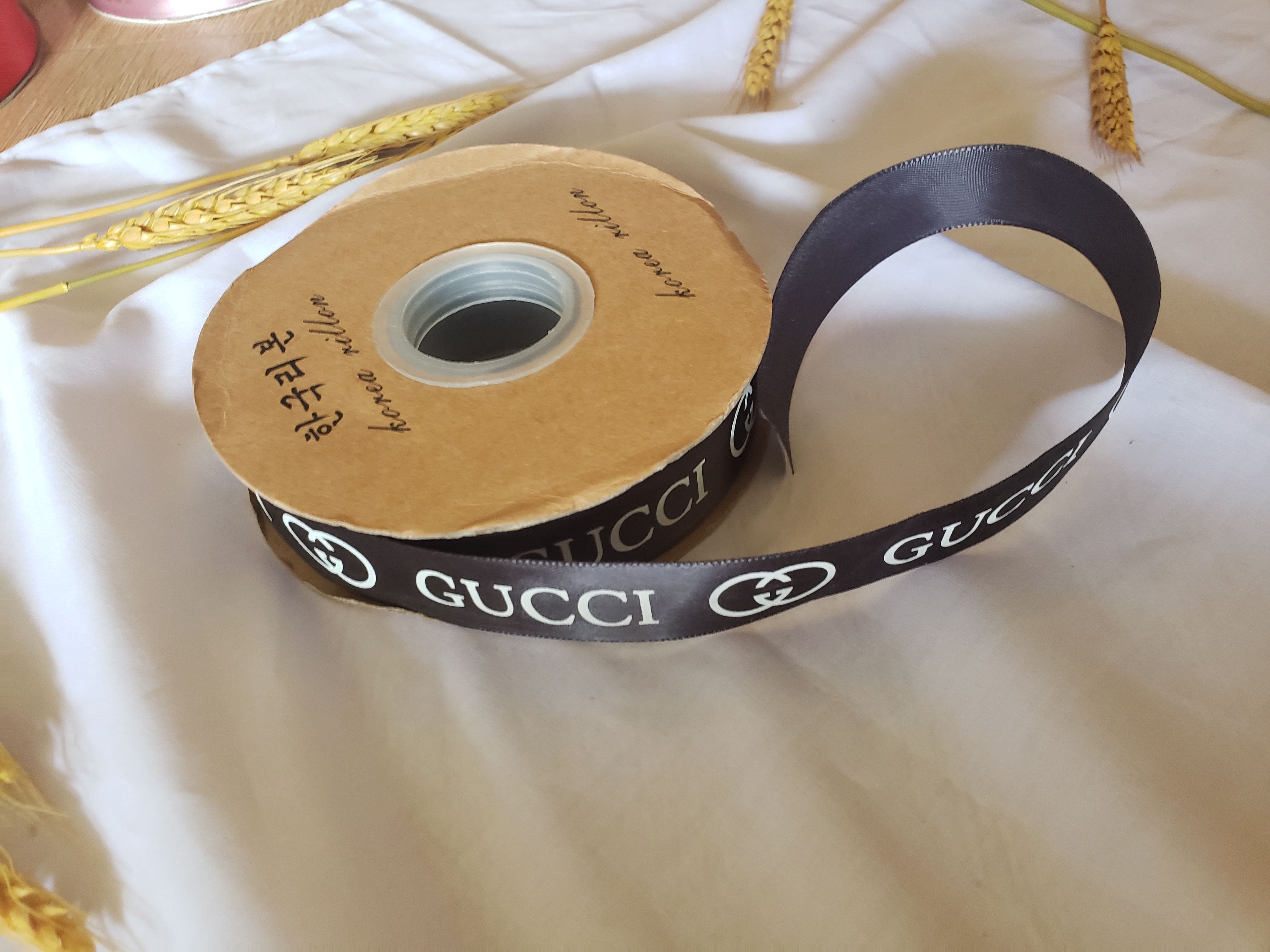 (Lẻ m)Ruy băng lụa chữ GUCCI 2,5cm