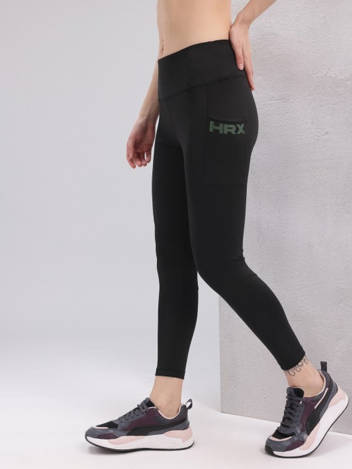 HRX by Hrithik Roshan Brand Logo Detail Rapid-Dry Cropped Training Tights For Women. 