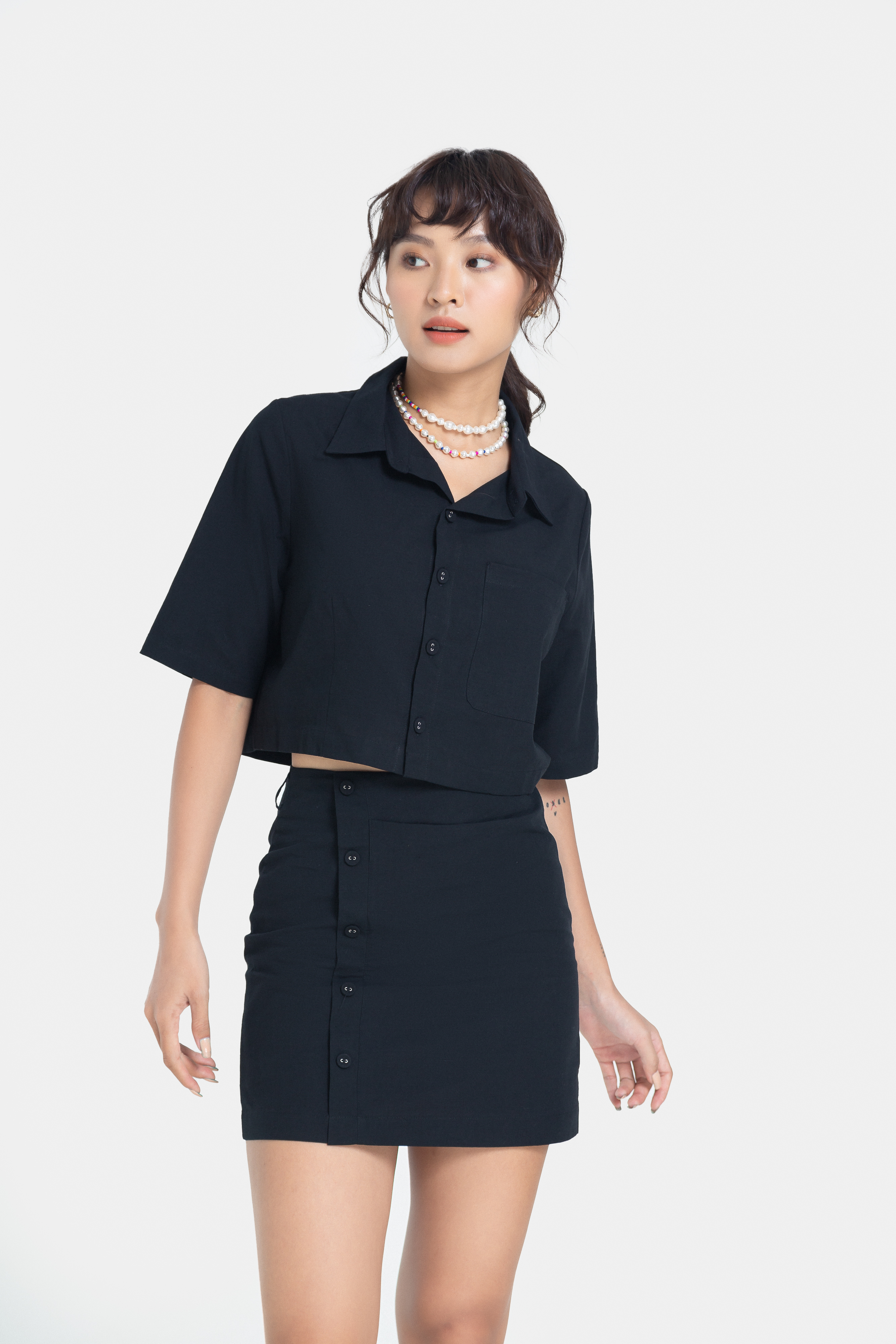 Váy Ngắn Thời Trang JUNO Mini Hàng Nút Lệch JNVNG007