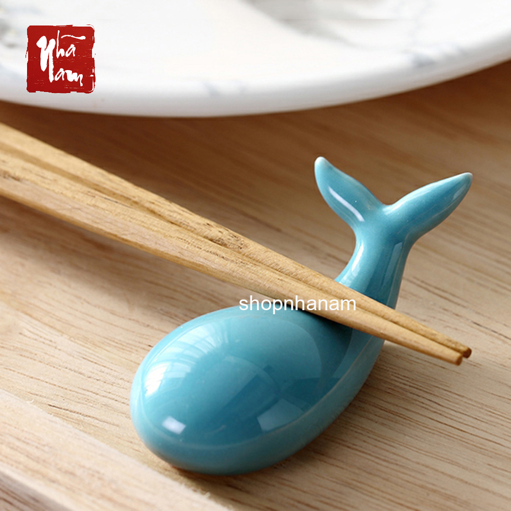 Ceramic Whale Statue Holding Chopsticks on the Dining Table