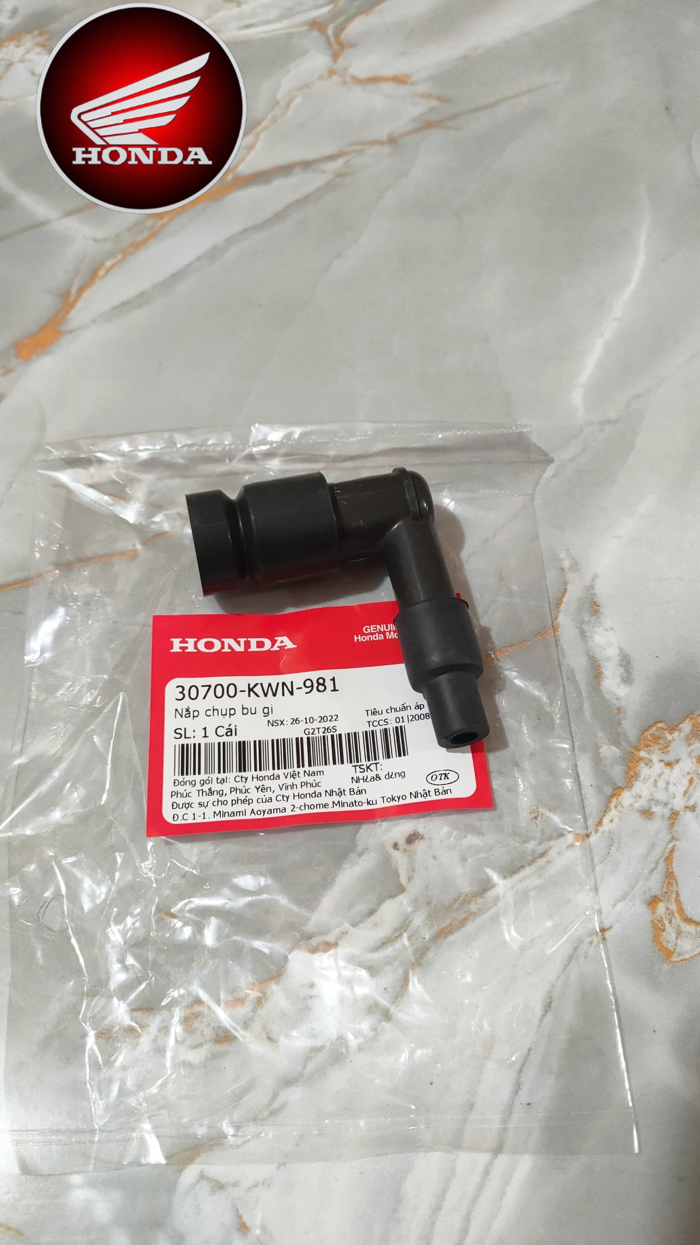 Nắp chụp bu gi PCX (30700KWN981)