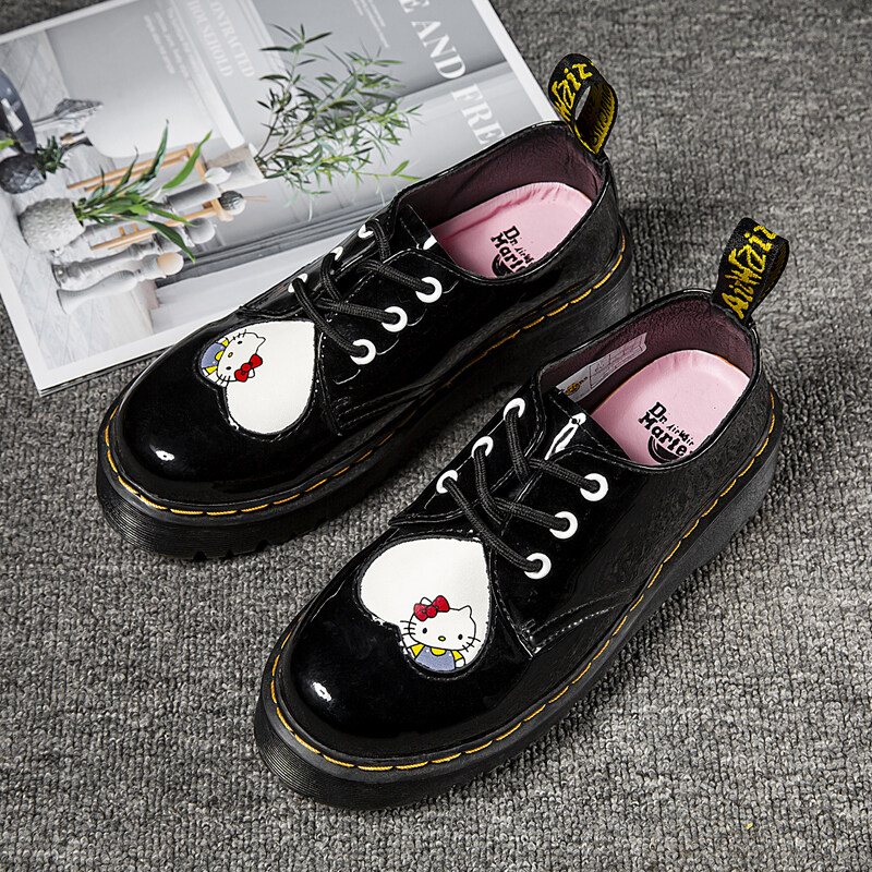 Hello kitty low hot sale top doc martens