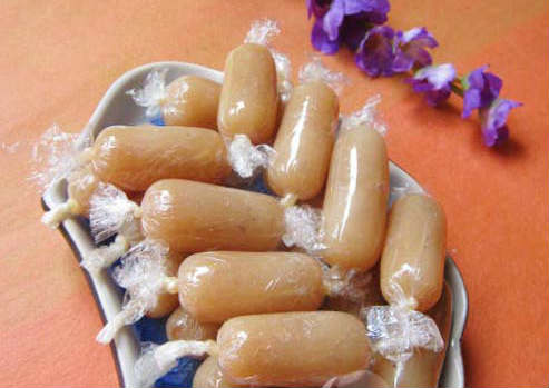 Giấy kính bóng gói mứt me, mãng cầu (100gr)
