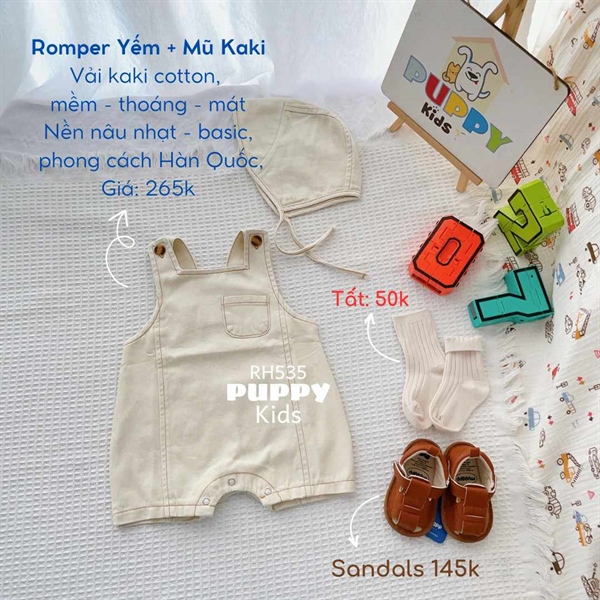 Quần áo trẻ em Romper Yếm + Mũ kaki, vải kaki cotton, nền nâu nhạt.