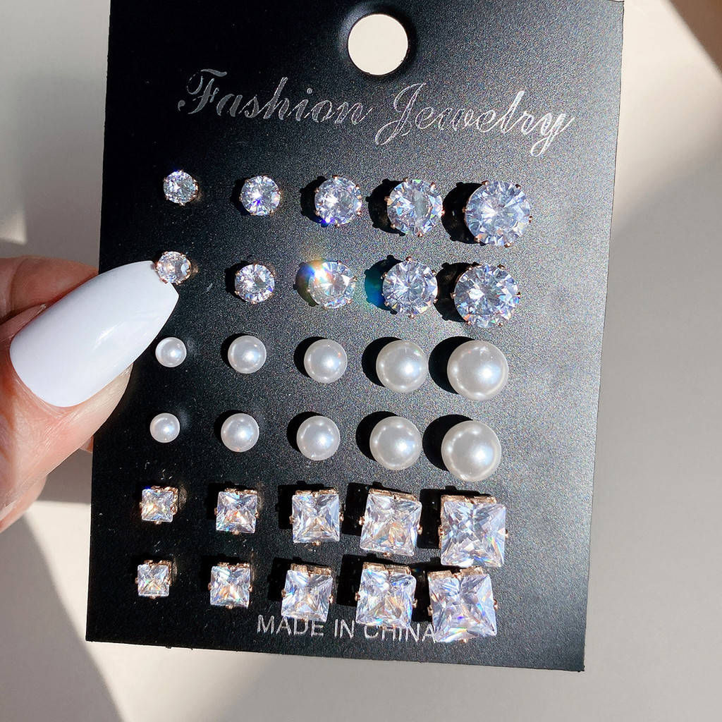 Celestial Sparkle: Sterling Silver Moissanite & Zircon Stud Earrings