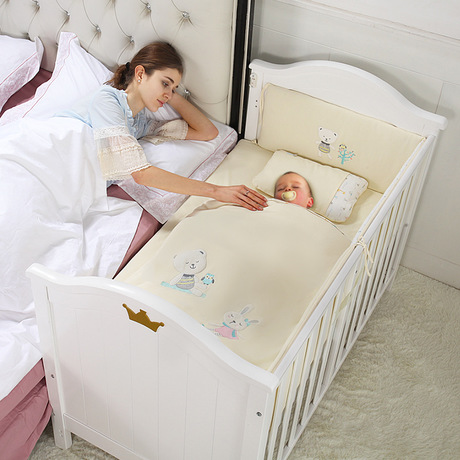 baby cot bedside