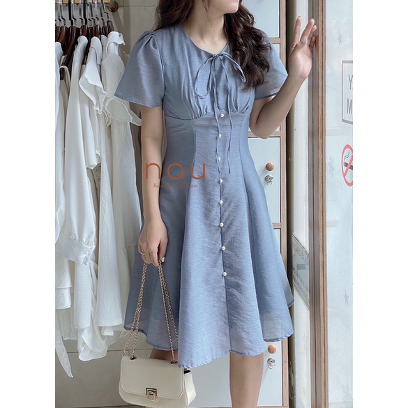Đầm phối nút ngọc dáng xoè nhẹ cột nơ cổ