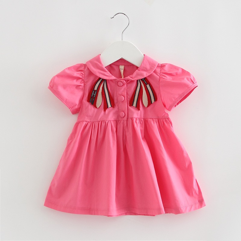 Váy bé gái đũi hồng thêu nơ ngực XHN904