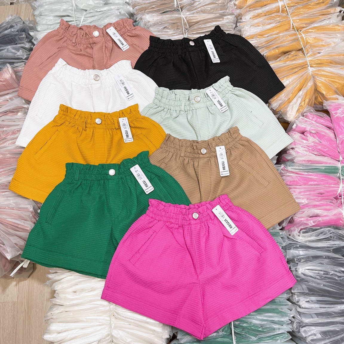 Quần short lưng thun chất xốp đóng nút eo co giản,ly store