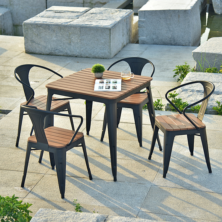 Wrought iron outdoor table and chair combination beer cafe terrace