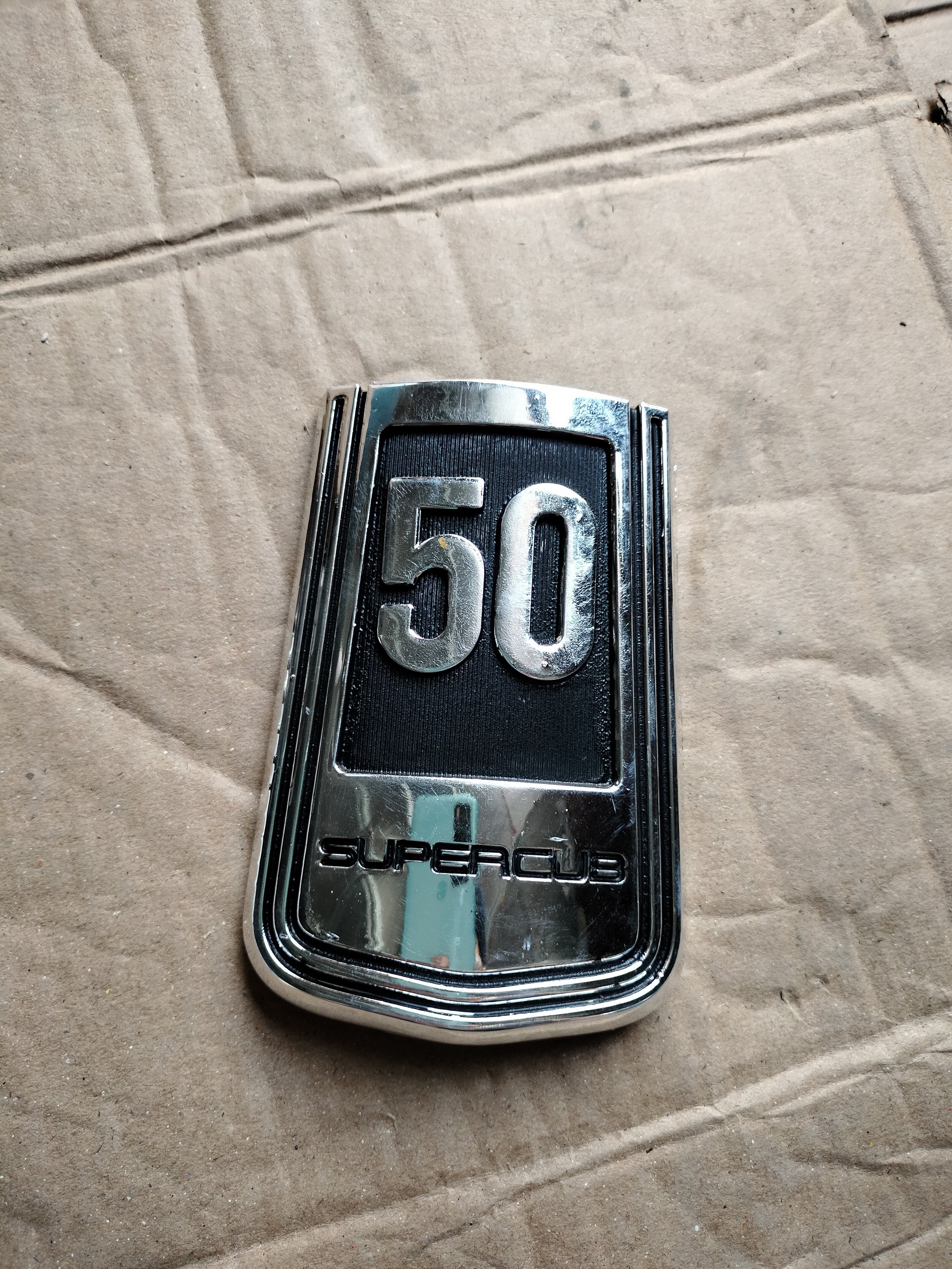 logo mặt lạ super cub 50