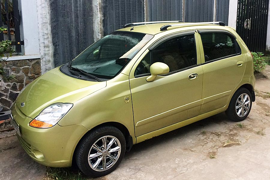 Tay mở cửa ngoài Daewoo Spark 2009