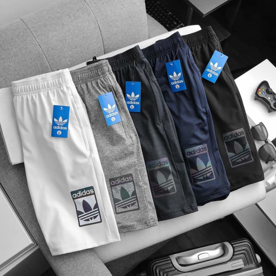 Quần short thể thao Nam poly 4 chiều logo phản quang