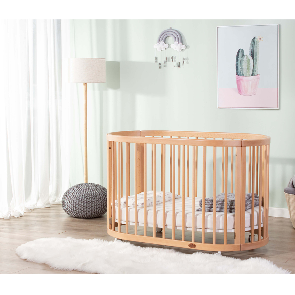 oval cot bed