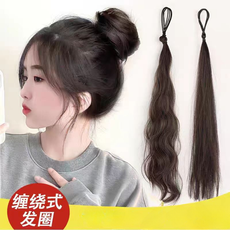 The wig has a loop that wraps around the bun head  simulating fluffy  lazy hair