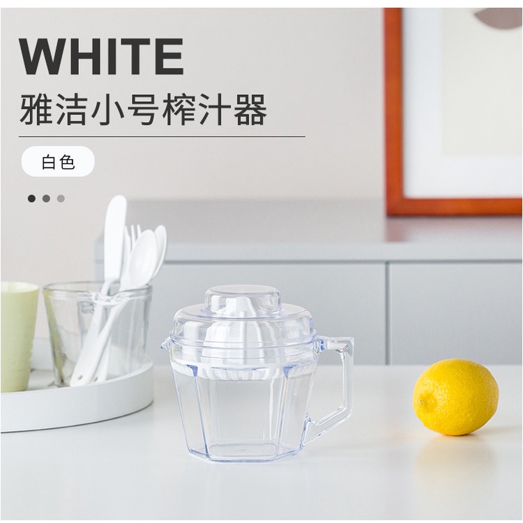 Dụng cụ vắt cam trong suốt