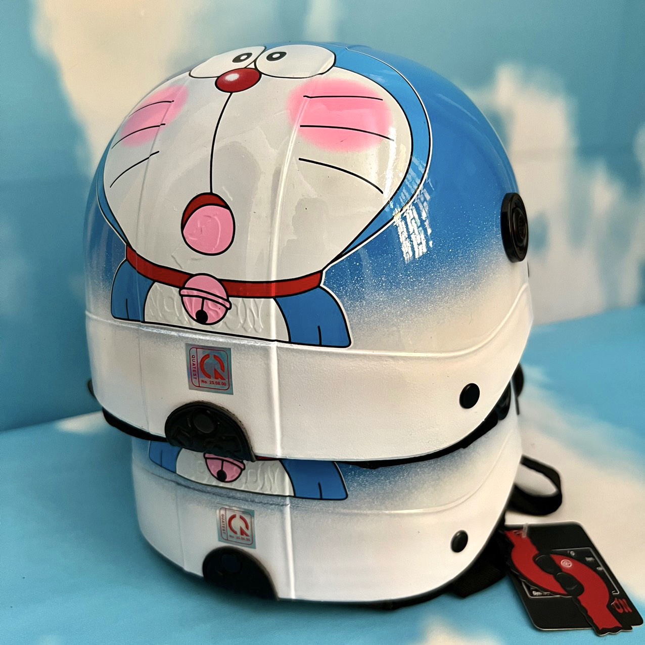 - NÓN BẢO HIỂM 2 LAI TEM DOREAMON