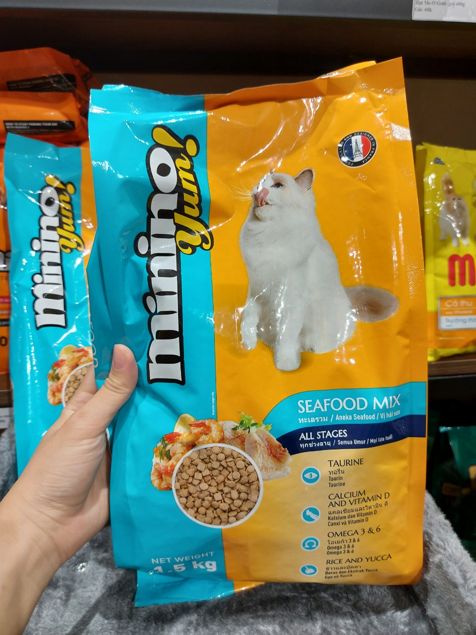 Thức ăn hạt cho mèo con và mèo lớn Minino vị cá ngừ/ Minino Yum hải sản - Gói 350g/480g/1.5kg