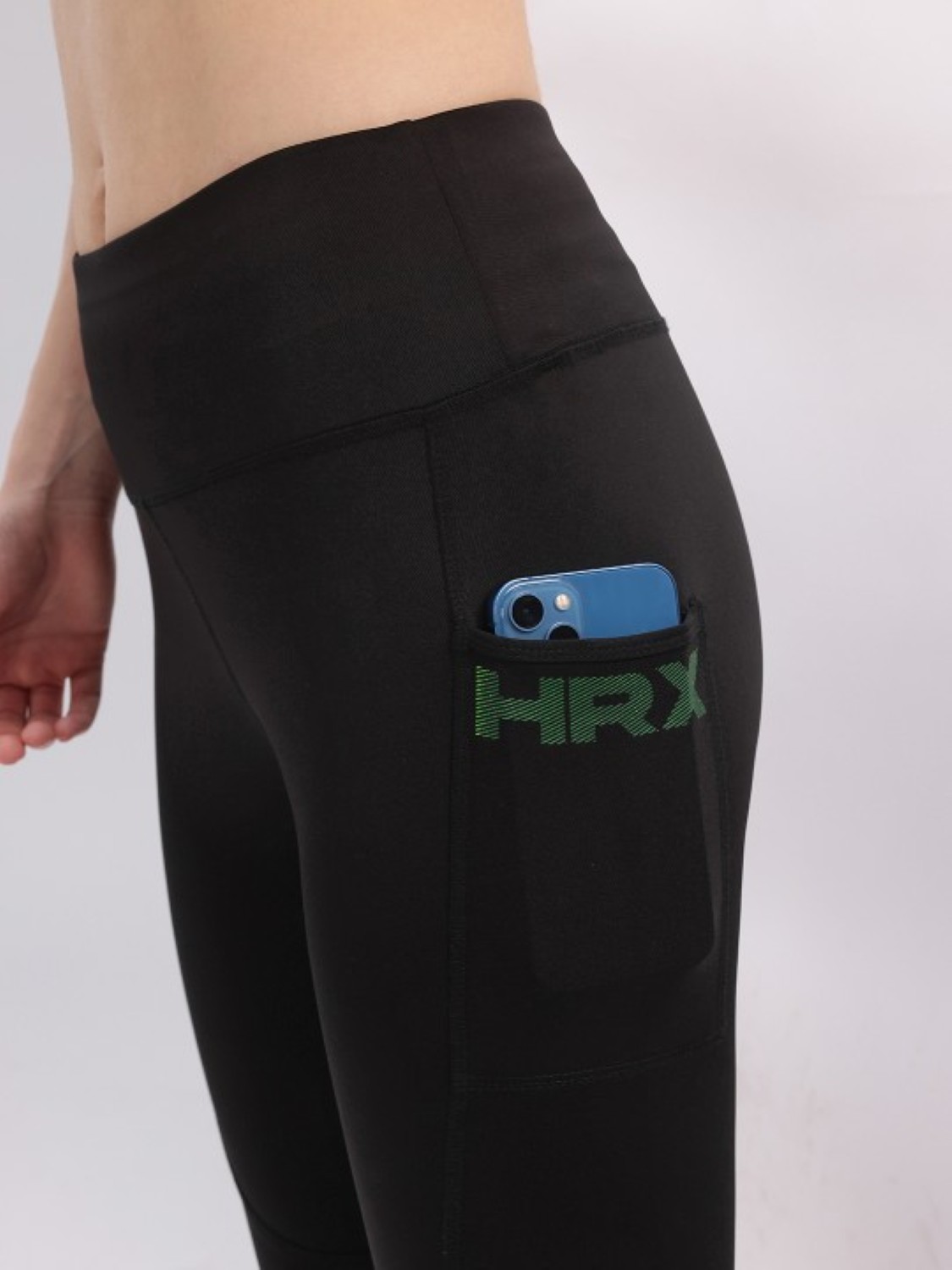 HRX by Hrithik Roshan Brand Logo Detail Rapid-Dry Cropped Training Tights For Women. 