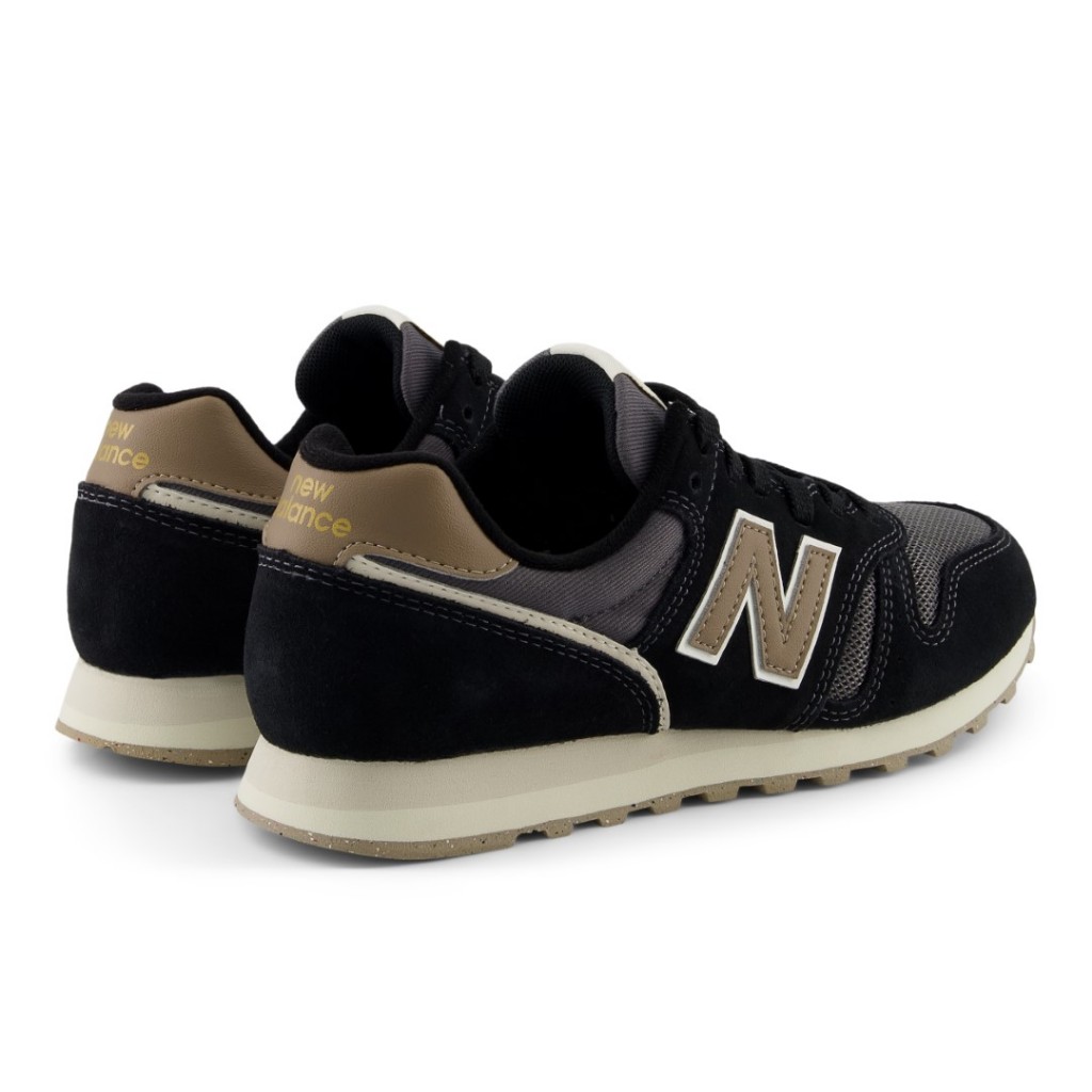 New balance black & gold 373 best sale suede & mesh trainers