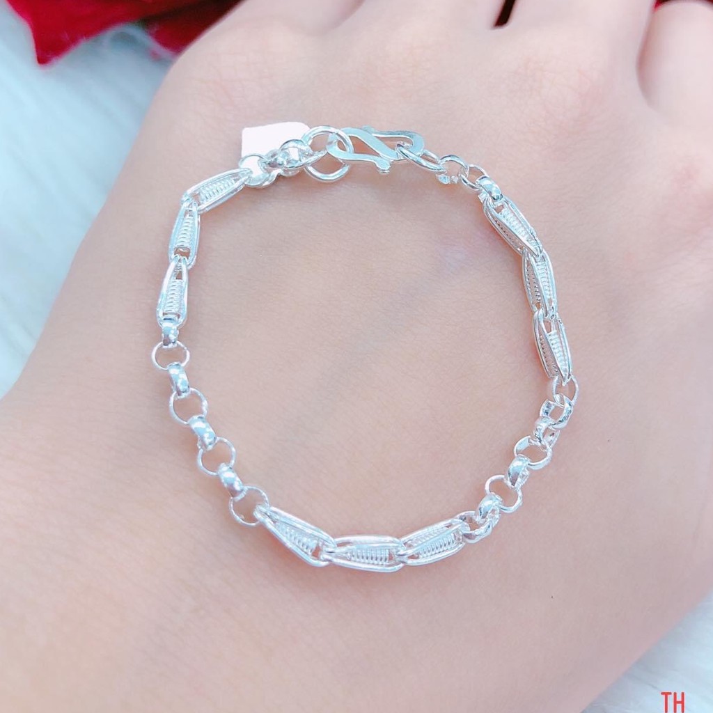 Lắc tay ,lắc chân bạc ta cho bé