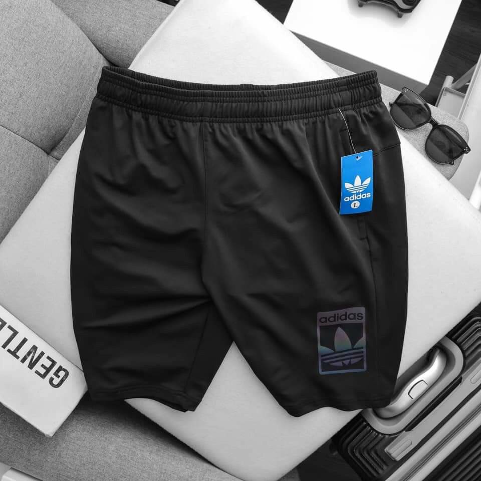 Quần short thể thao Nam poly 4 chiều logo phản quang