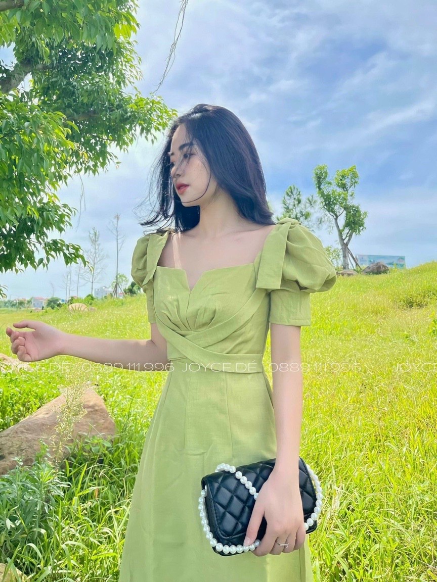 Đầm đan dây tay phồng xếp nơ vai xinh xắn kiểu dáng trẻ trung thanh lịch với gam màu xanh nhã nhặn - th