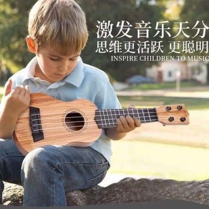 ĐÀN GITA UKULELE  ĐÁNH ĐƯỢC CHO CÁC BÉ