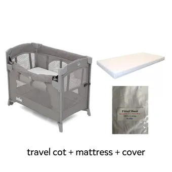 white travel cot