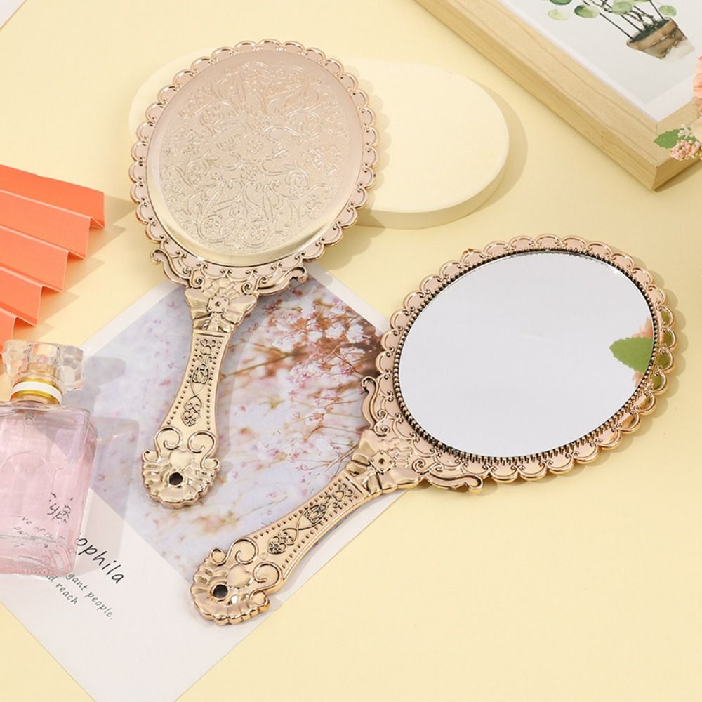 Creative High Definition Handheld Mirror Pattern Handle Easy to Carry Carved Small Mirror Odorless Portable Dressing Mirror Living Room. 