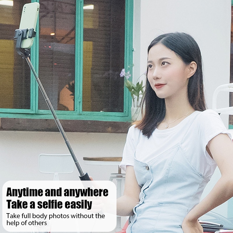 New R1 Universal Bluetooth Selfie Stick Tripod with Wireless Remote Control Mini Retractable Selfie Stick 360 ° Phone Bracket