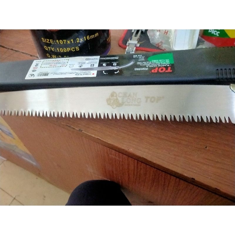 cưa top cầm tay