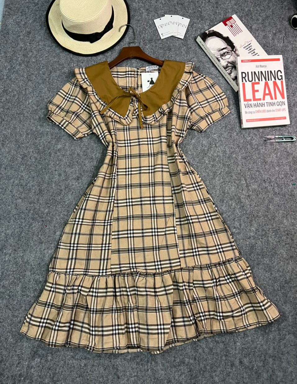 Đầm caro xoè baby doll đuôi cá cổ bèo nhún