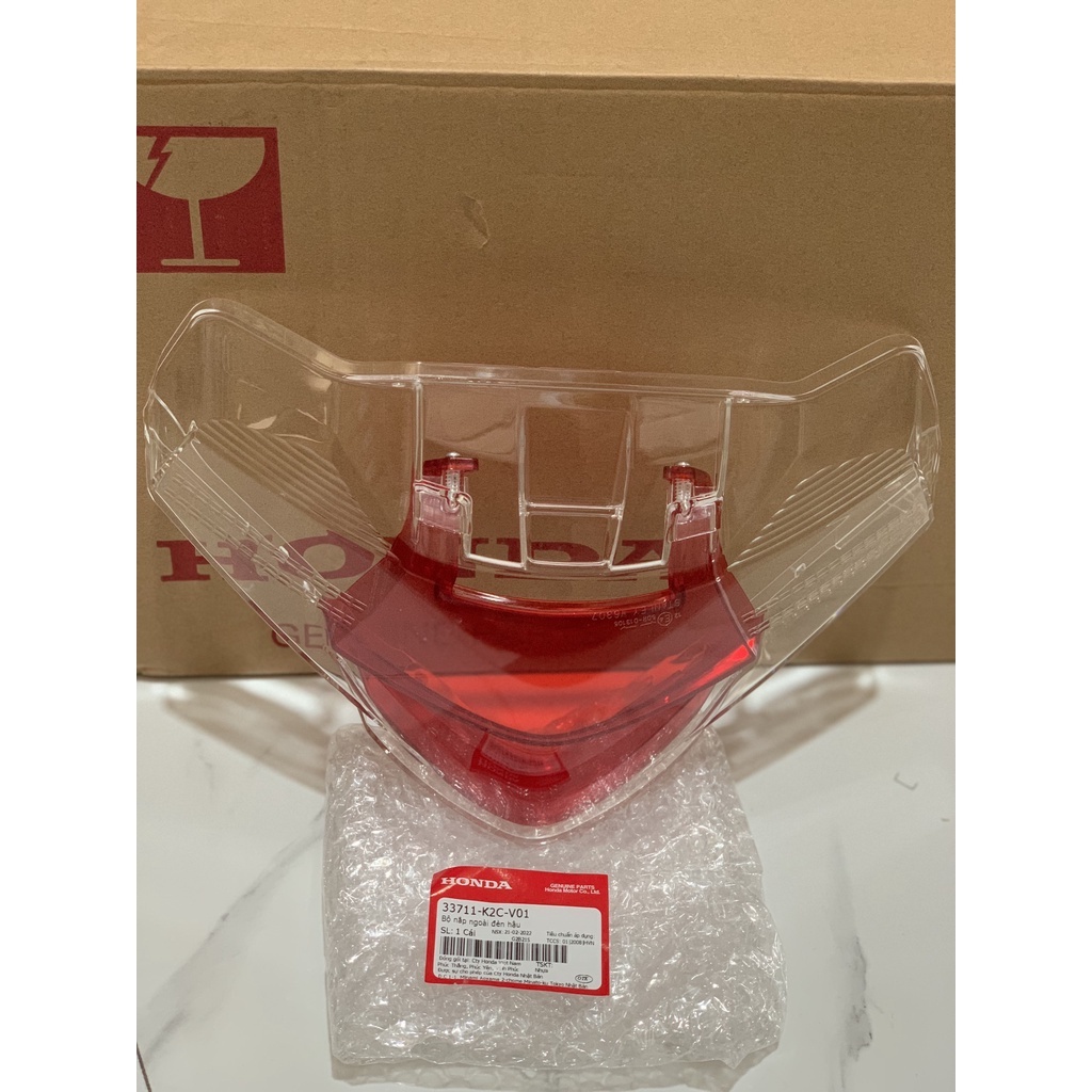 Bộ nắp ngoài đèn hậu- kính trong Vision chính hãng Honda