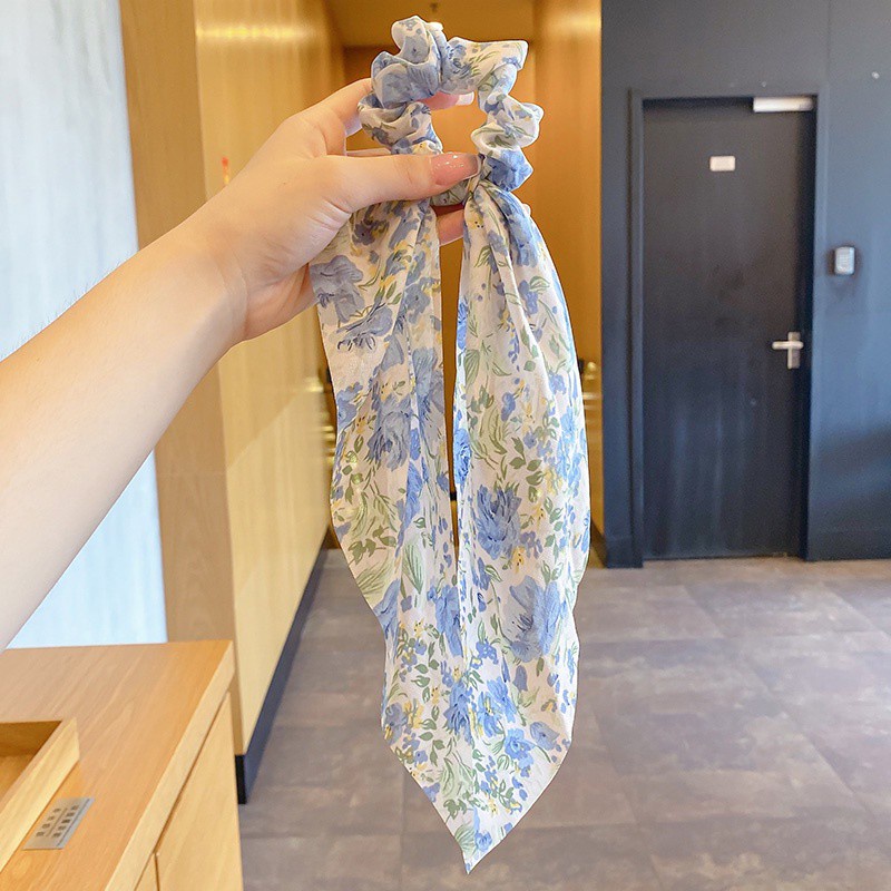 Fashionable hair rubber band decorated with a Korean style floral bow.