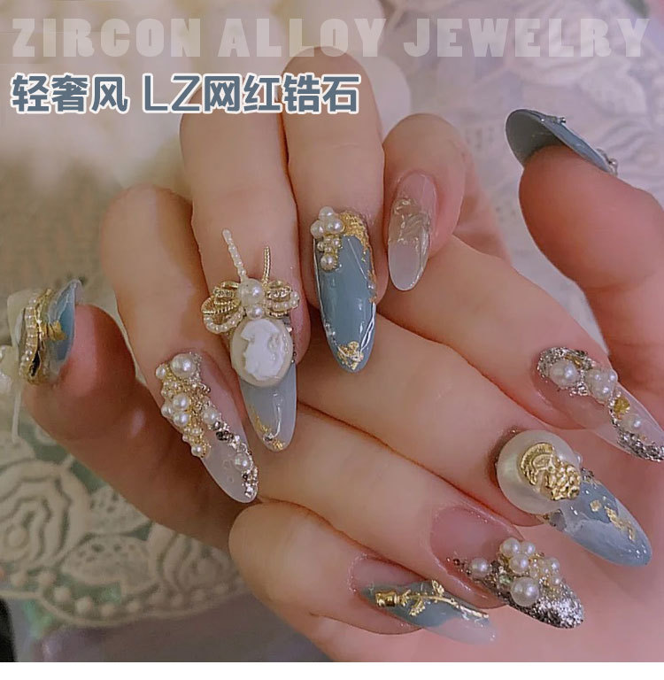 Charm Nơ  Vàng Bạc Đính Móng CN