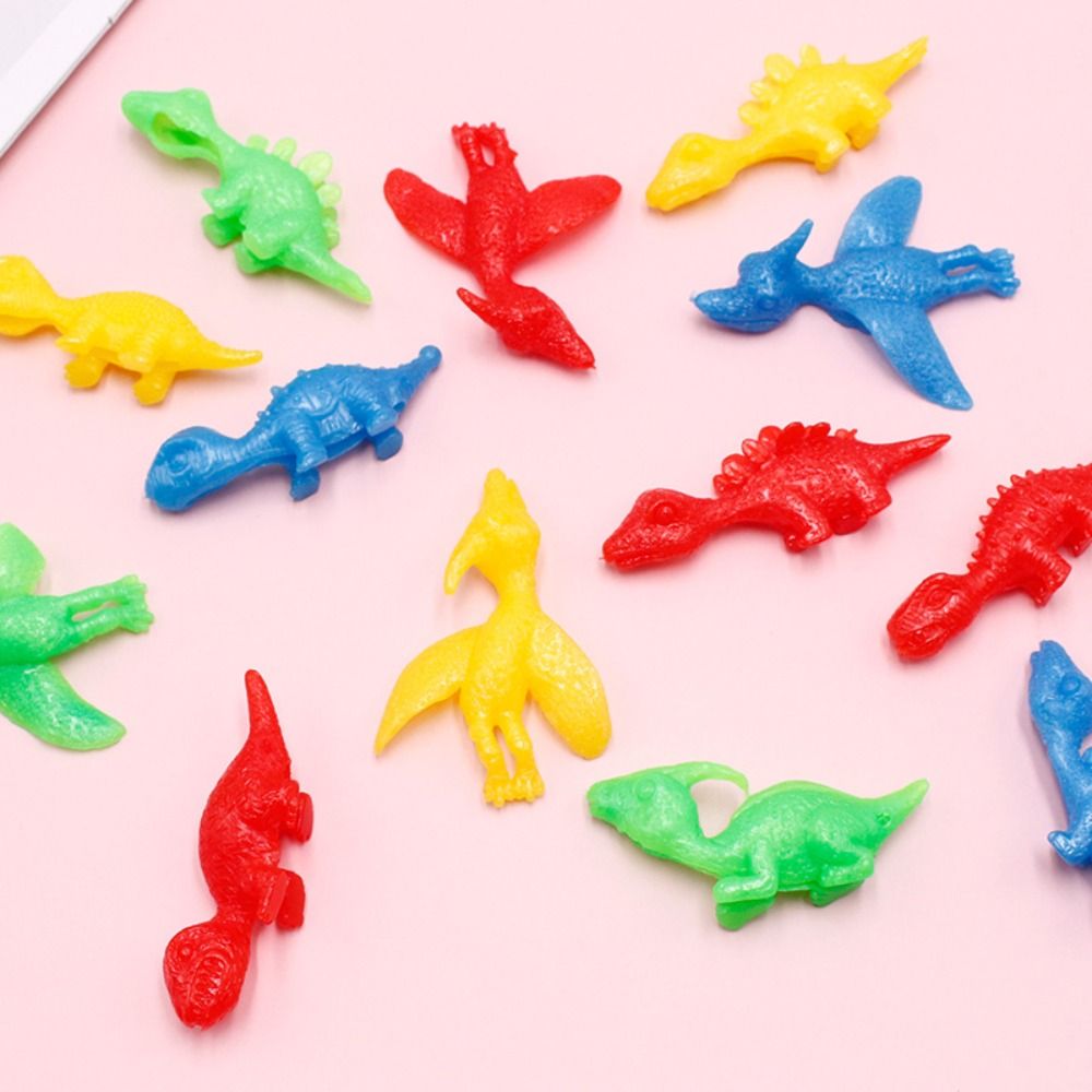 EYVRPAU 8 Fronde à Doigt Dinosaure Volant – Jouet Extensible En Caoutchouc Souple, Cadeau Anniversaire Enfant Dès 3 Ans, Lot De 8 Couleurs Aléatoires