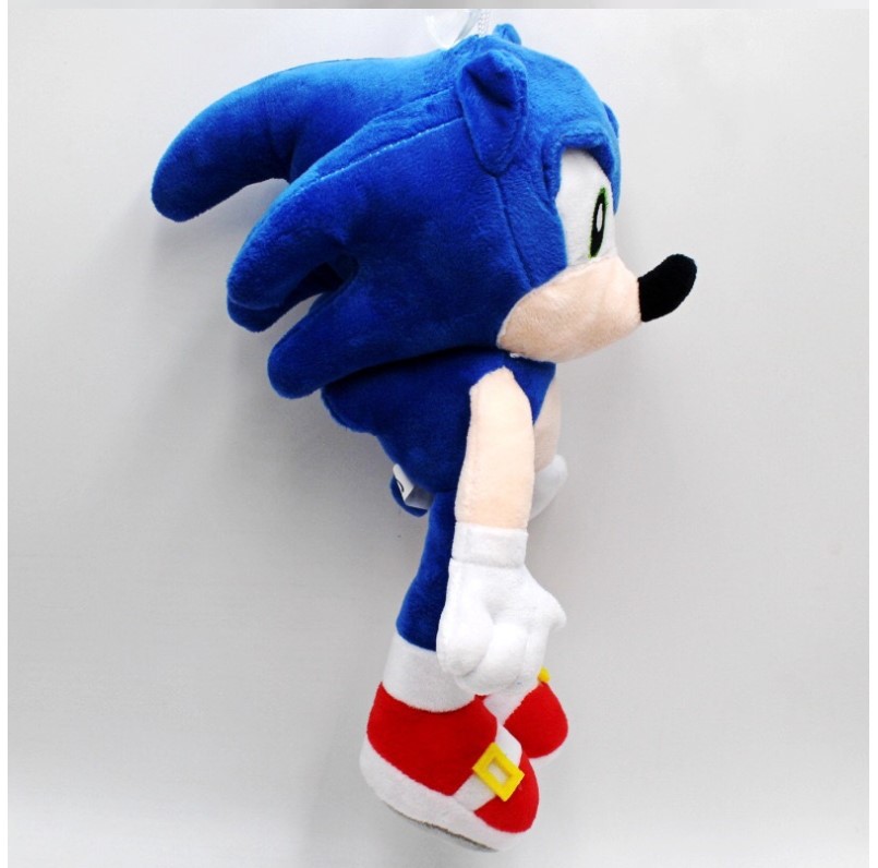 blue hedgehog among plush