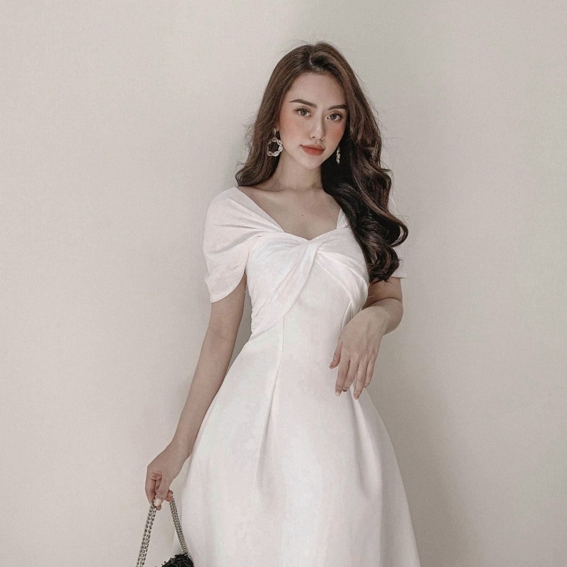 Đầm xoắn ngực tay xoè 2 màu