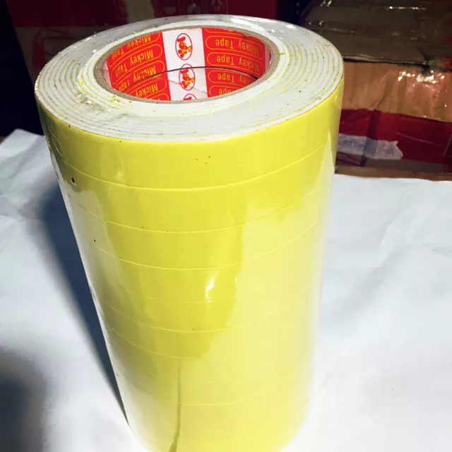 Lốc 10 cuộn băng keo mousse xốp 1 mặt / 2 mặt vàng 2.4cm