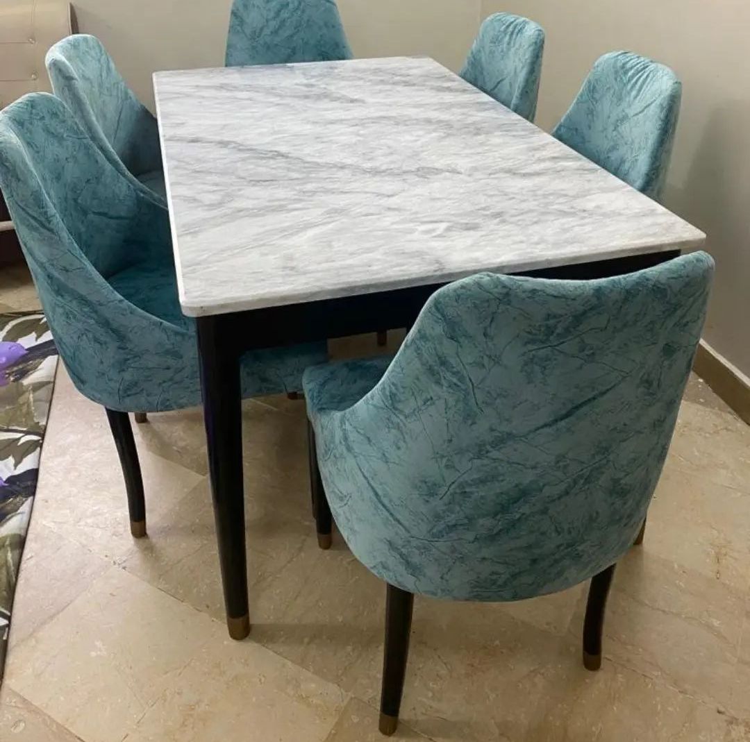 customizedFour seater dinig table set, marble top textured dinig table top, valvet up. 