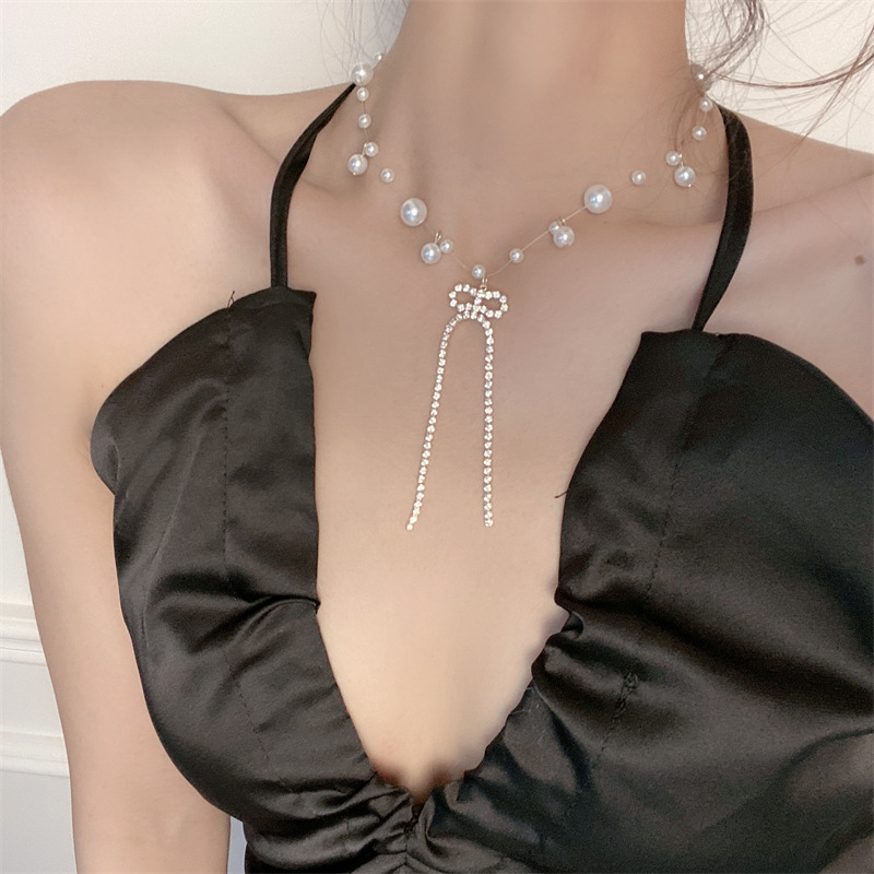 Vòng cổ Bell Mew phong cách mong manh nơ đính đá VC162