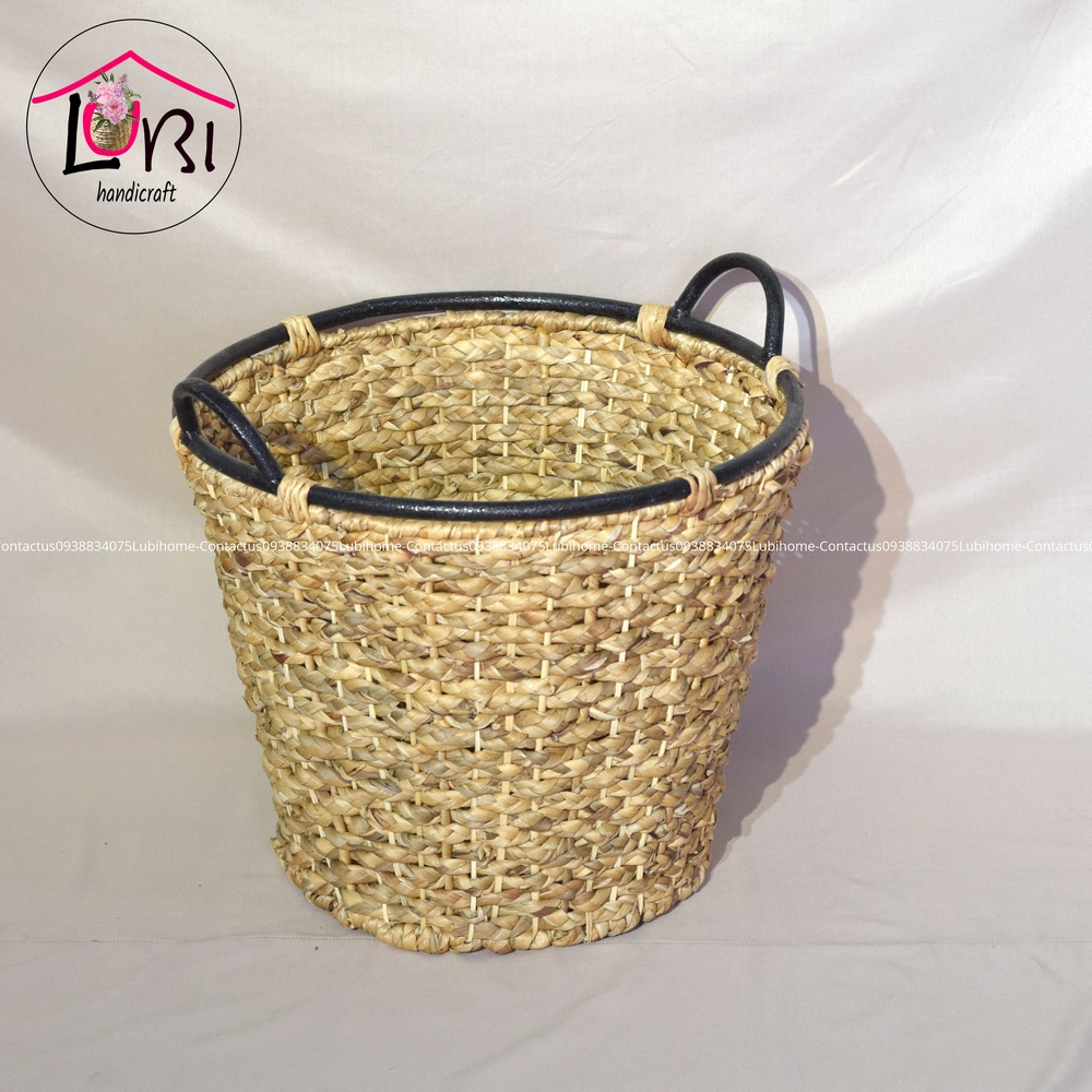Round water hyacinth baskets with vintage iron handles