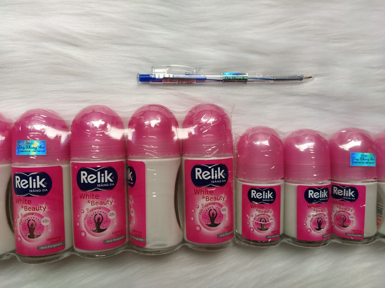2 chai Lăn khử mùi Relik hồng chai 50ml