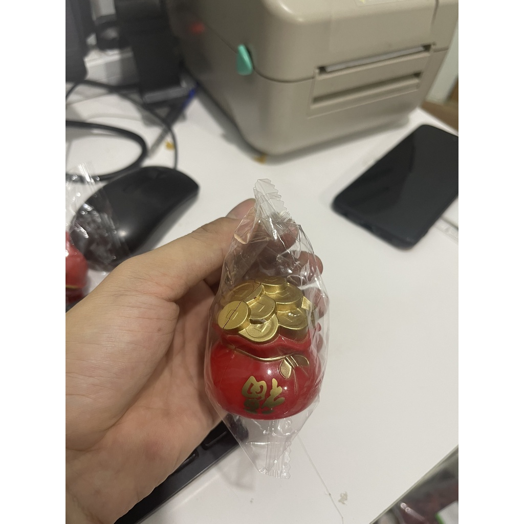 Ông thần tài trang trí bánh ngọc thịnh