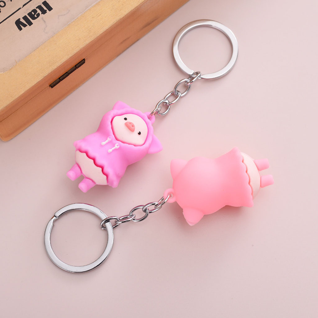 Móc khóa heo con mặc áo mưa cute
