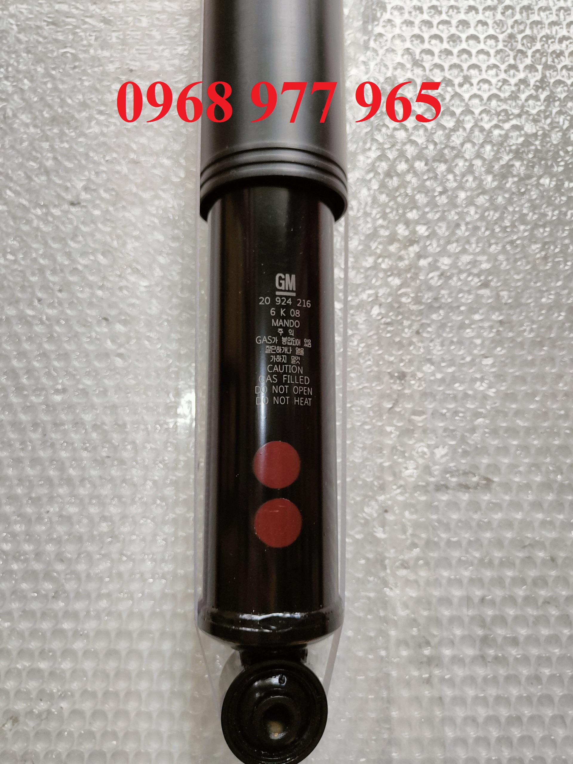 Giảm xóc sau Captiva ( Giá 1 chiếc , HQ )