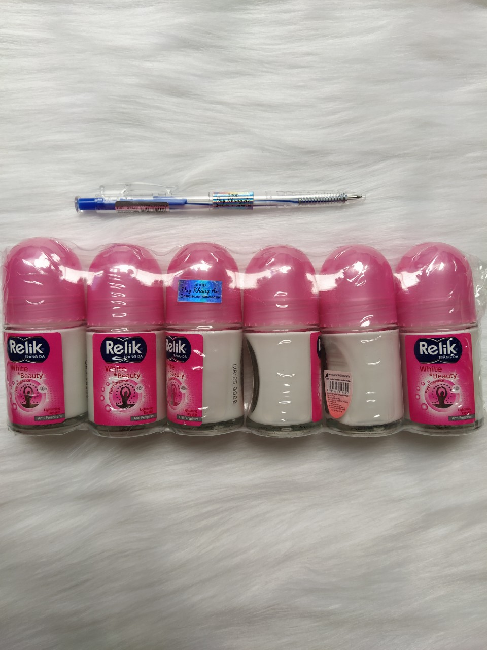 2 chai Lăn khử mùi Relik hồng chai 50ml