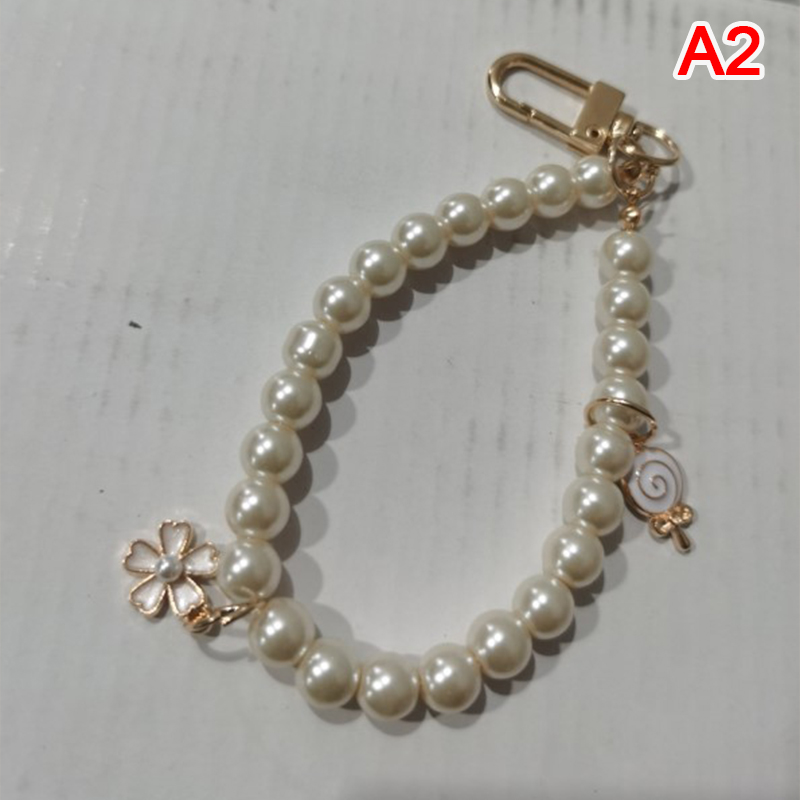 Vintage%20Korean%20Fashion%20Pearl%20Keychain%20Women%20Girl%20Gold%20Metal%20Chain%20Key%20Ring%20KELONG%20-%20Image%209