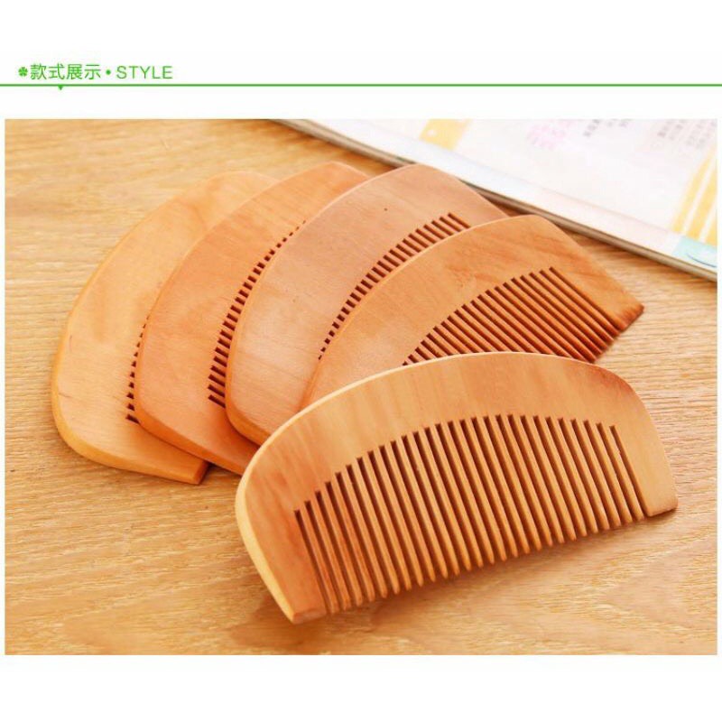 Lược chải tóc bằng gỗ massage đầu